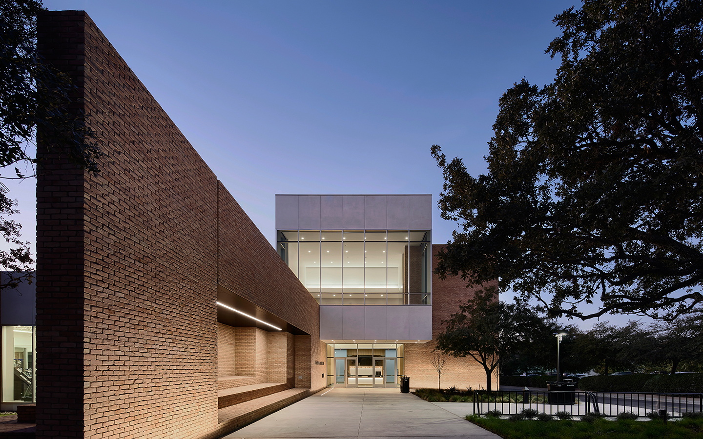 Exterior at dusk of the Recreation and Athletic Center by Specht Novak Architects. Shot by Andrea Calo.