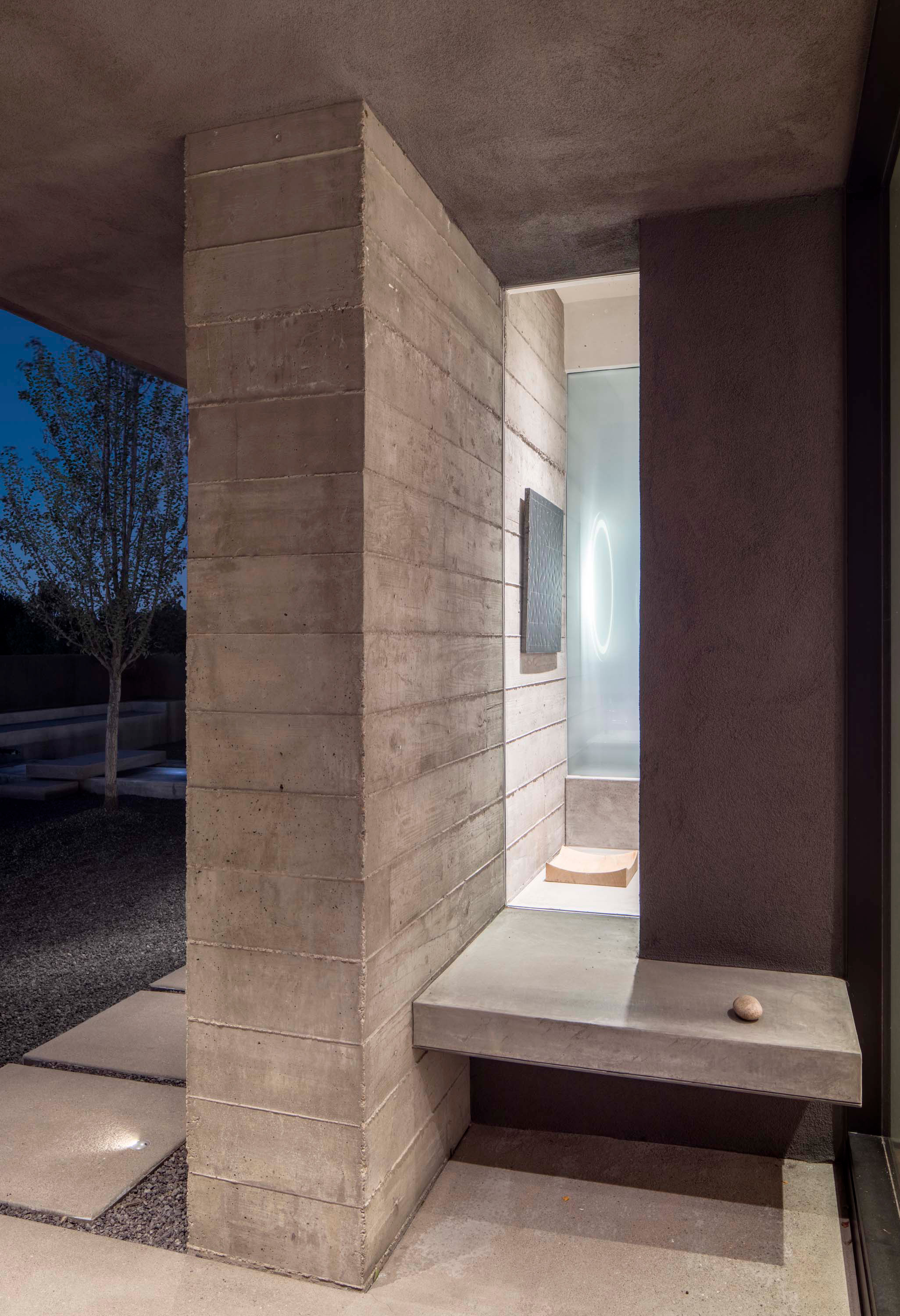 Exterior photo of the Sangre de Cristo House by Specht Novak Architects. Shot by Casey Dunn, featuring geometric concrete accents of the perimeter of the home.