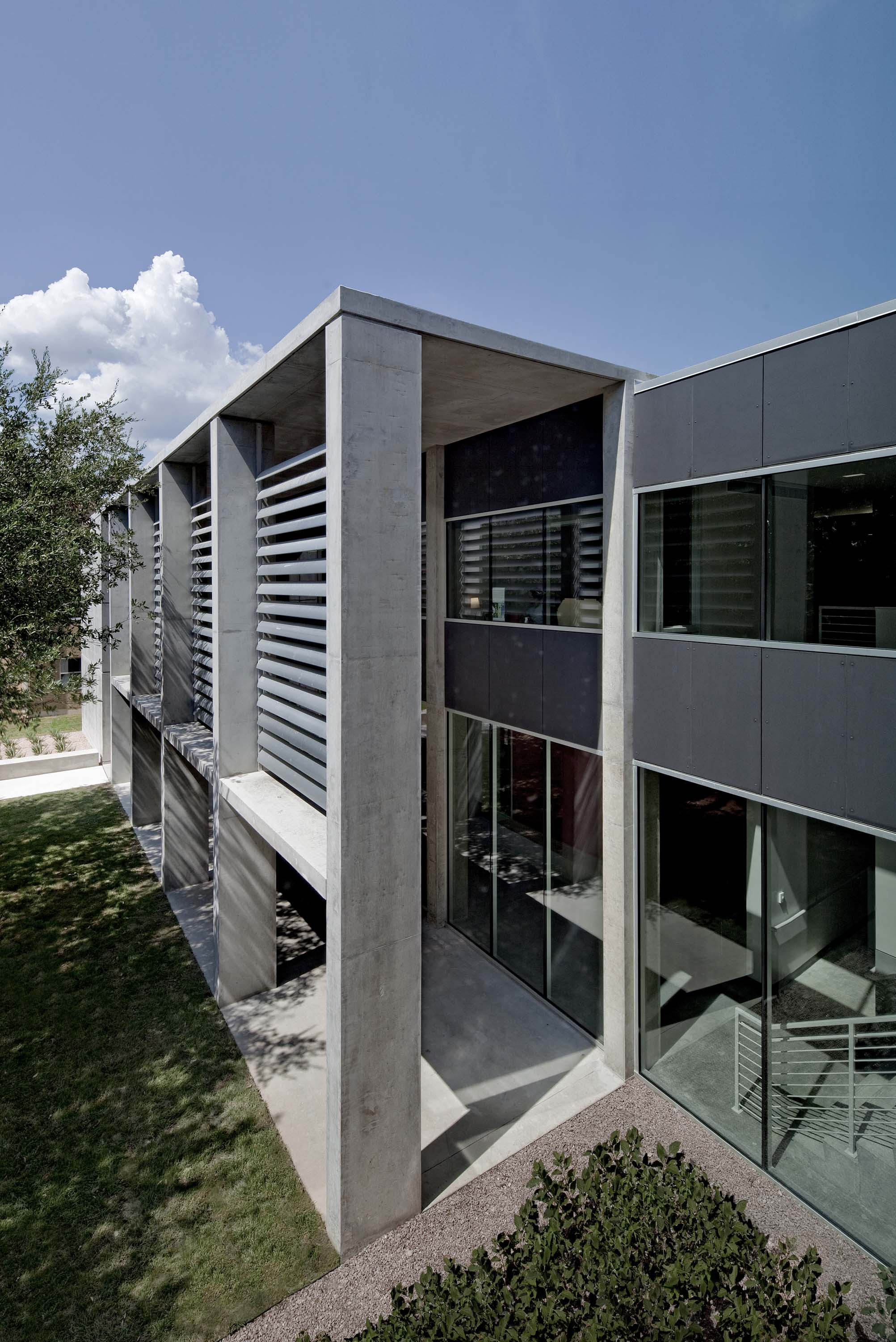 View of exterior of Doyle Hall by Specht Novak Architects to showcase the wall panels beyond the windows. Shot by Taggart Sorensen.