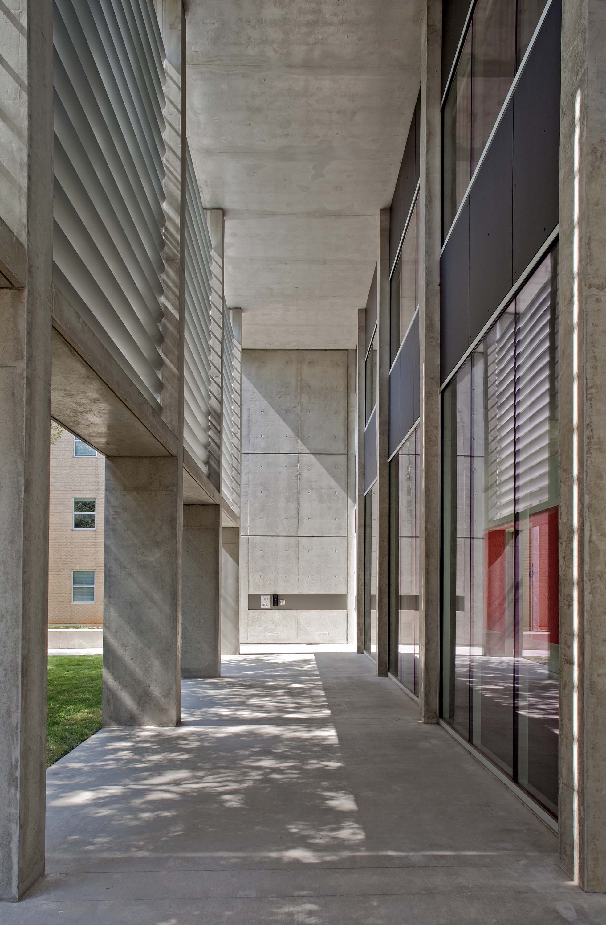 Exterior covered walkway of Doyle Hall by Specht Novak Architects. Shot by Taggart Sorensen.